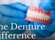 hands holding dentures